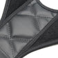 Black posture brace fabric detail with gray center panel and stitched seams, textured padding