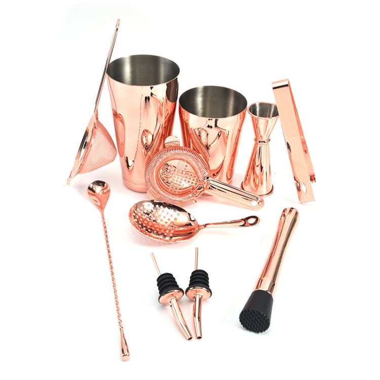 Rose gold cocktail mixing set with jigger, mesh strainer, spoons, pourer and tongs