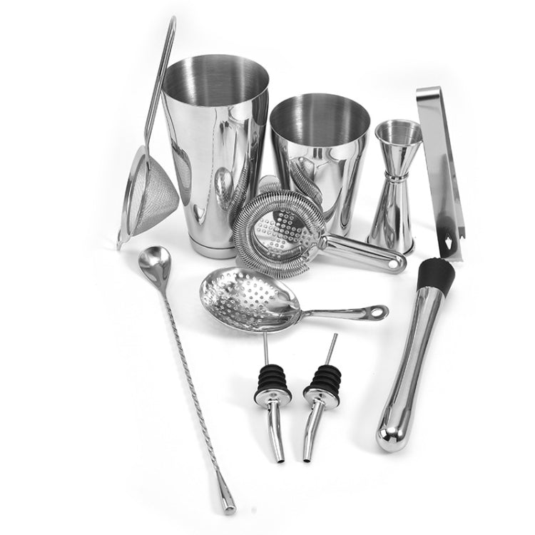 Silver cocktail mixing set with cups, mesh strainer, spoon, pourer and mixing tools
