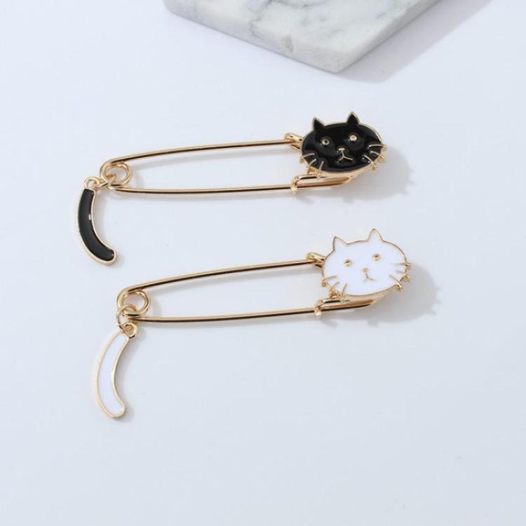 Cat brooch set: black and white cat designs on gold-toned safety pin backs