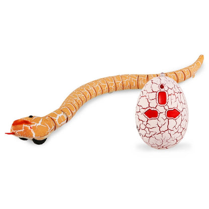 Orange remote-control snake toy with white egg controller and red face details