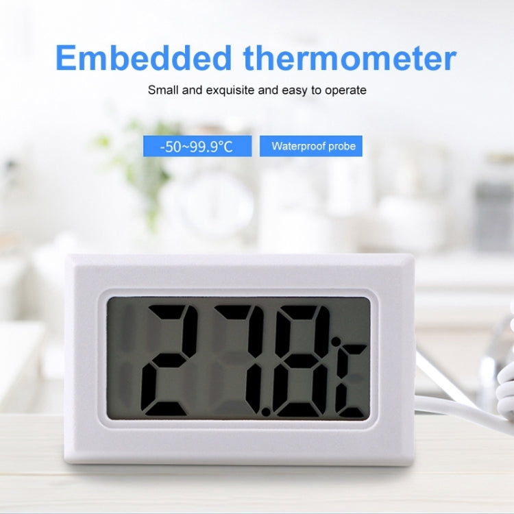White mini LCD indoor thermometer with Celsius screen and probe cable on table