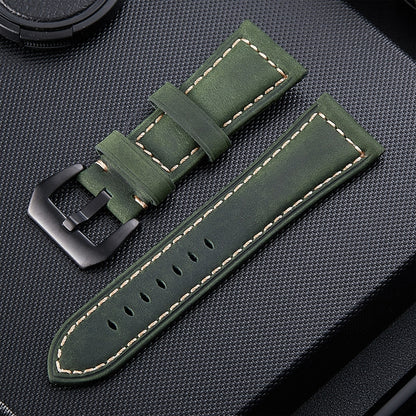 Olive green leather watch band with metal buckle and stitched edges, 22mm.