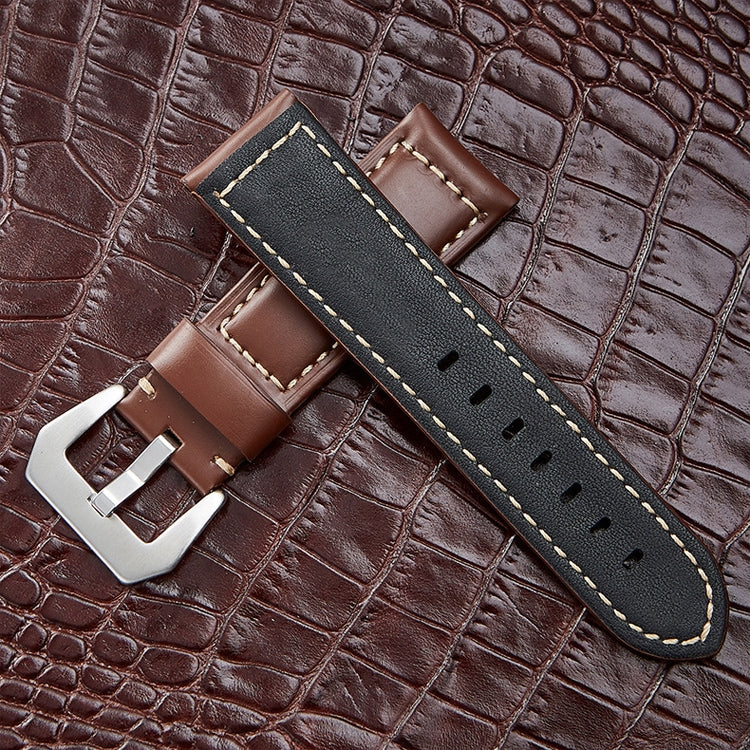 Dark brown leather watch band with silver buckle, double-stitched edges, and hole detailing