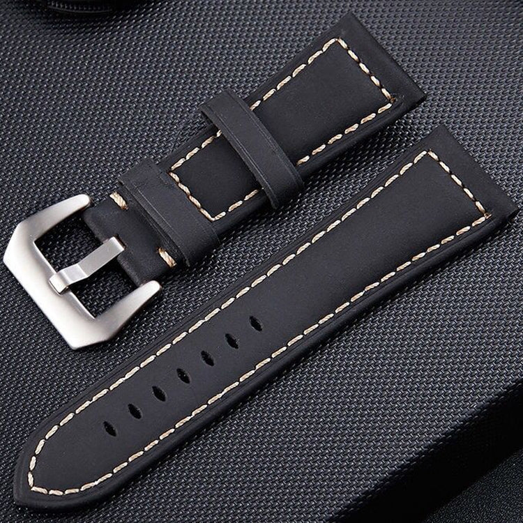Black leather watch band with black buckle and contrast stitching, with perforated strap holes