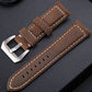 24mm dark brown leather watch band with silver buckle and stitched hole detail