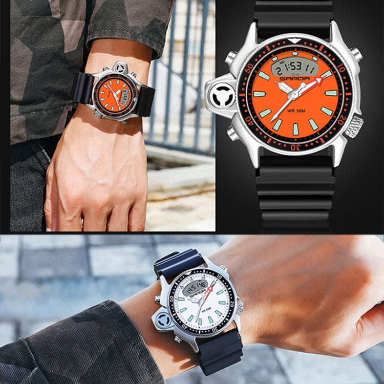 Multifunction sports wrist watch with orange dial and black rubber strap on wrist