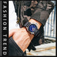 Multifunction sports wrist watch with blue dial and black rubber strap on wrist