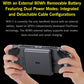Handheld game console held in hands, with external battery pack on back