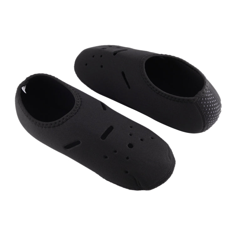 Pair of black diving socks with open toe and vented texture
