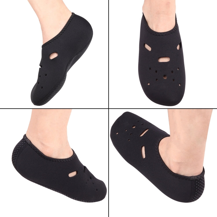 Set of black swim socks shown from multiple angles with open toe and holes
