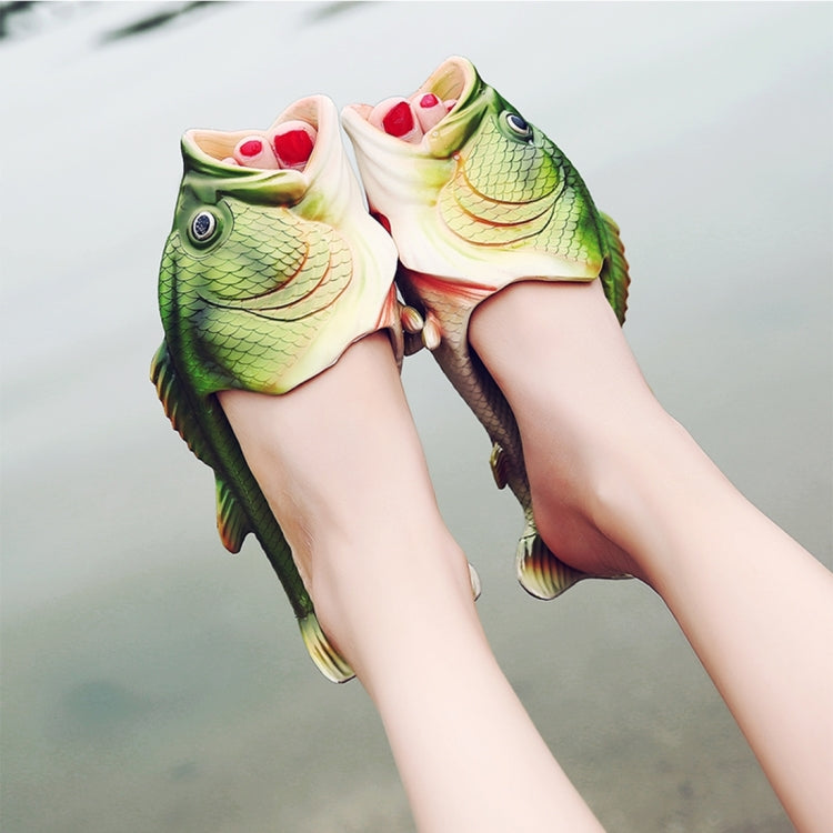 Pair of green fish-shaped EVA sandals, open-toe slip-on with molded fish details