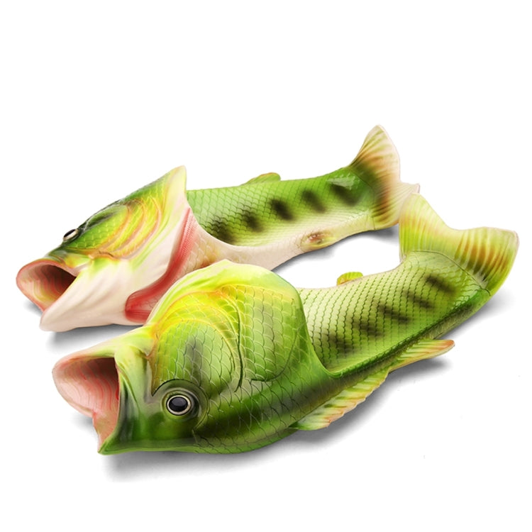 Pair of fish-mouth style sandals in green with open toe and molded fin details