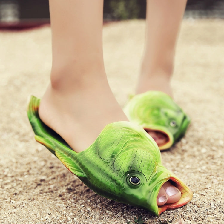 Fish-shaped green EVA slide sandals with molded scales and open toe