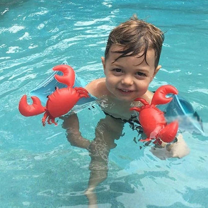 Red inflatable crab-shaped arm floats on a child in a swimming pool