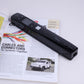 Black portable WiFi document scanner resting on printed user guides and pages