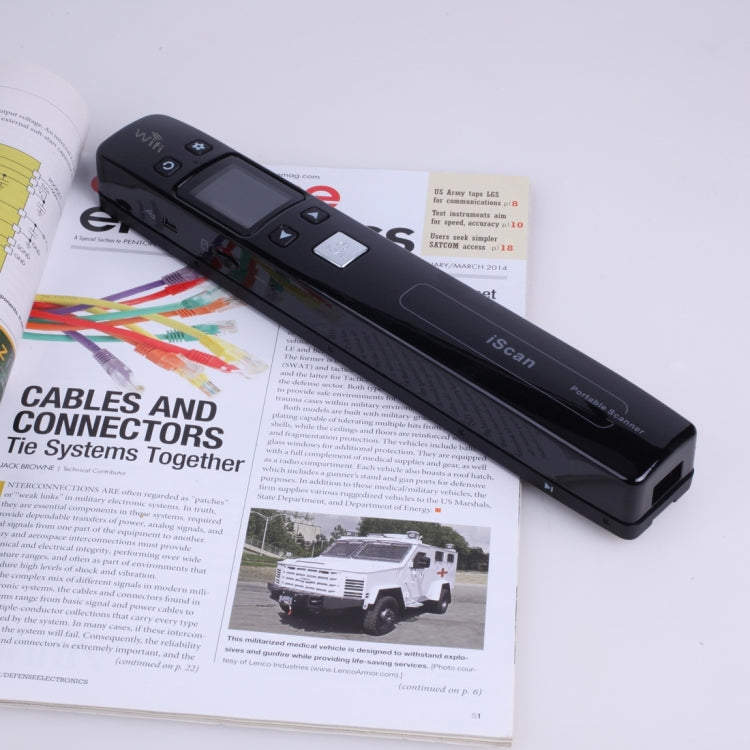 Black portable WiFi document scanner resting on printed user guides and pages