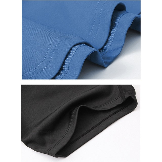 Quick-dry athletic skirt fabric close-up with visible stitching on blue and black