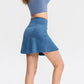 Blue athletic flared mini skirt side view with smooth waistband