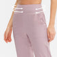 Women’s loose sports trousers, mauve pink, high-rise elastic waistband, side pockets