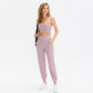 Women’s loose sports trousers, mauve pink fabric drape close-up