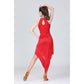Red halter neck dance dress with keyhole back cutout and tassel fringe