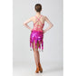 Back view: fuchsia sequin Latin dance dress with crisscross straps and fringe hem