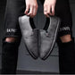 Gray leather slip-on shoes with elastic gores and round toe