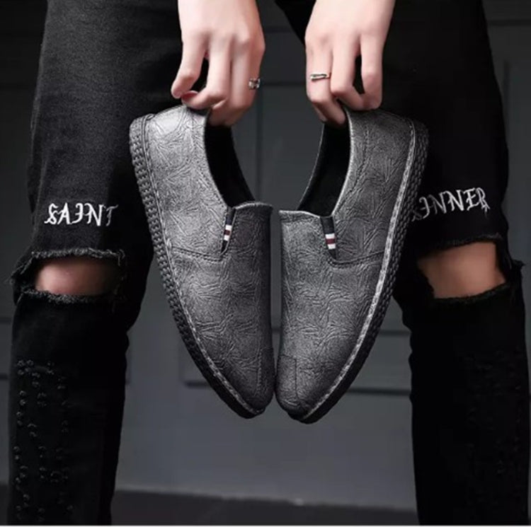 Gray leather slip-on shoes with elastic gores and round toe
