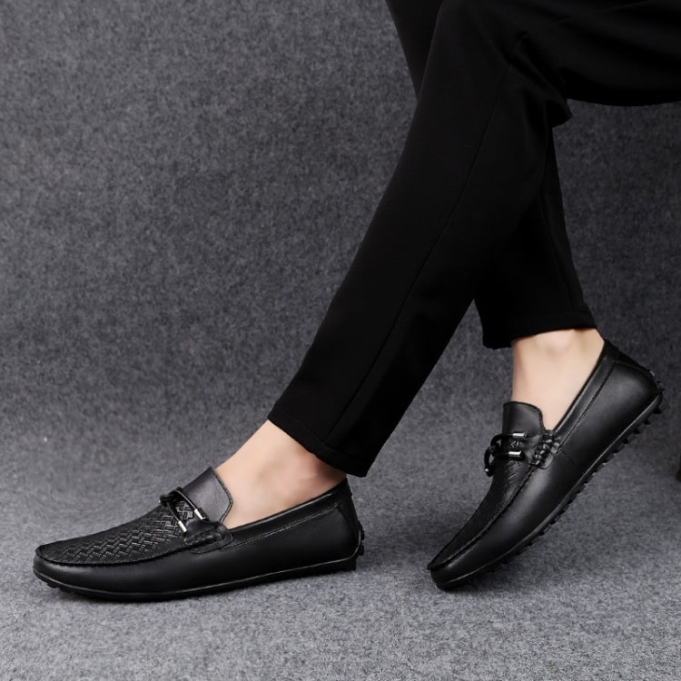 Men's black leather loafers with round toe and lace-up strap detail, side view