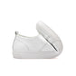 White low-top casual shoe with rounded toe, stitched upper, and platform sole