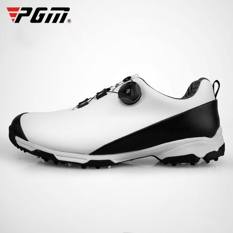 Waterproof men's golf shoe sneaker with rotary buckle, white upper and black trim, spiked outsole