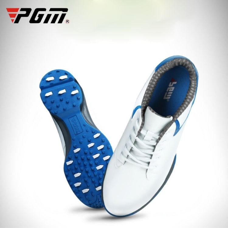 Men's white and blue lace-up golf sneakers with blue studded bottom