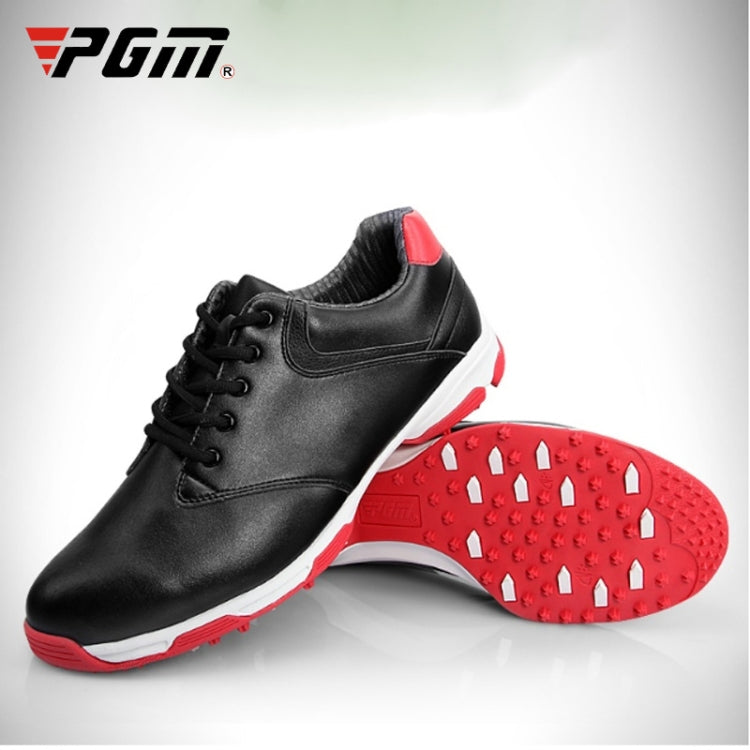 Men's black lace-up golf sneakers with red grip outsole and white trim