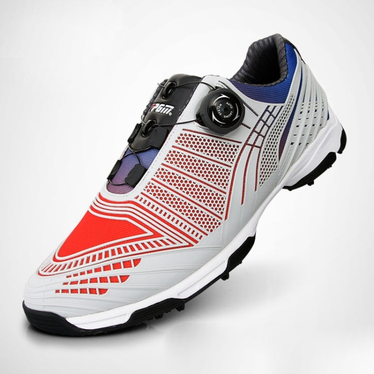Men's golf sneakers, white upper with red and blue accents, black dial buckle and laces