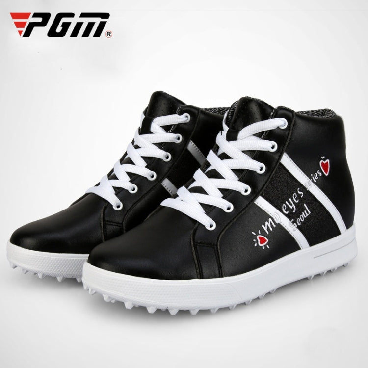 Black high-top golf sneakers front view; white laces, side graphic, and studded sole