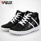 Black high-top golf sneakers with white laces and stitched side stripe; textured sole
