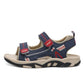 Kids navy sport sandals with two straps, perforated panels, and chunky beige sole