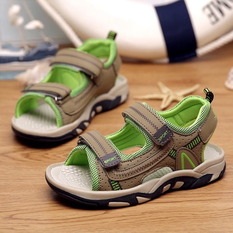 Kids' green and tan sport sandals with hook-and-loop straps and grippy outsole