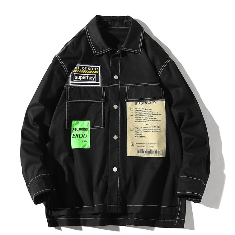 Men's black shirt jacket with long sleeves, button front, and chest logo tag panels