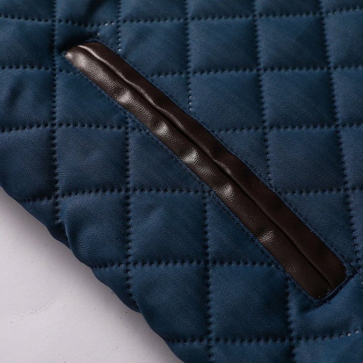 Navy quilted jacket with diagonal brown faux-leather trim panel
