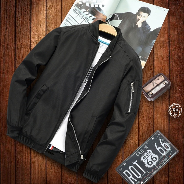 Men's black casual jacket showing zip chest pocket and ribbed cuffs