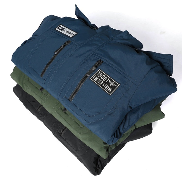 Folded men's hooded jacket set in blue and green with zip and patch details