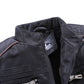 Men's black leather jacket close-up of collar label and front zipper placket