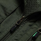 Vest zipper close-up with metal pull tab and stitched placket