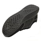 Black outsole tread of electrical-insulating work shoes with textured grip pattern