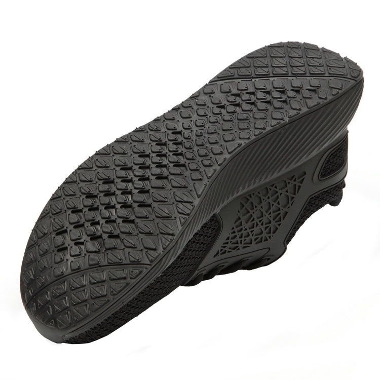 Black outsole tread of electrical-insulating work shoes with textured grip pattern