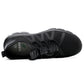 Black safety sneaker showing cushioned insole and textured rubber outsole tread