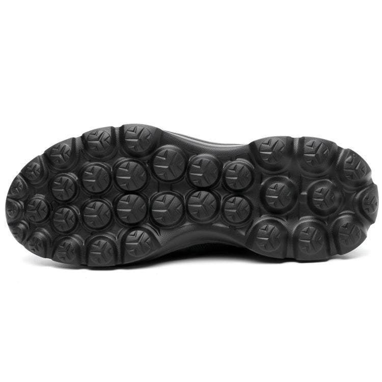 Black safety shoe with grippy rubber outsole traction tread