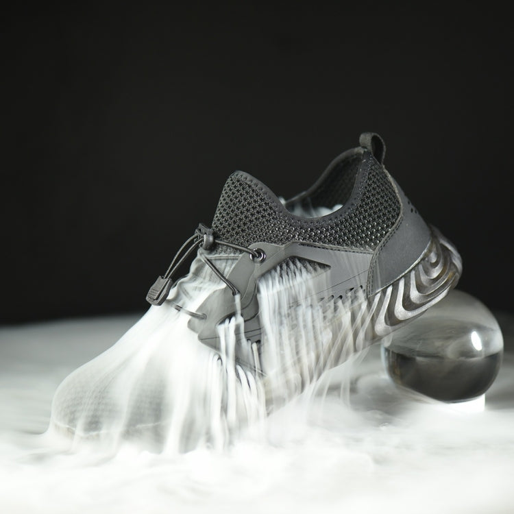 Black work safety shoe with mesh upper and low-profile protective sole